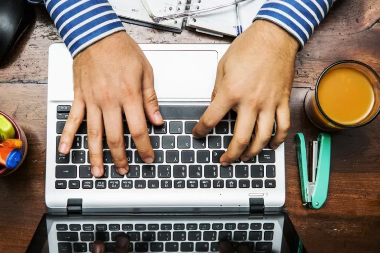 Aerial view of hands on a keyboard