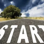 The word "Start" written on pavement