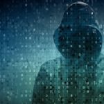 cybersecurity hacker behind binary code