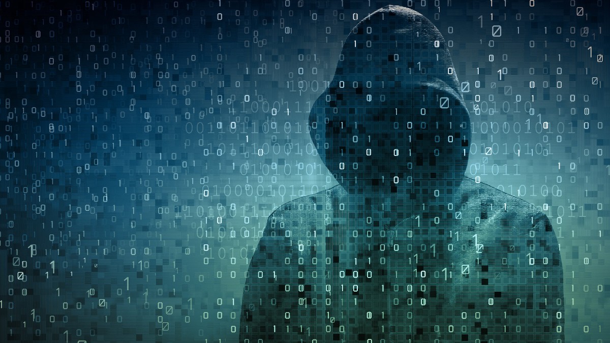 cybersecurity hacker behind binary code