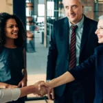 Team of employees in suits meeting