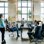 Employees hot desking in the office