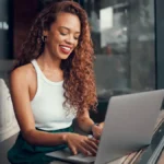 Employee doing content optimization on her laptop.