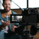 Entrepreneur filming short-form videos for his business.